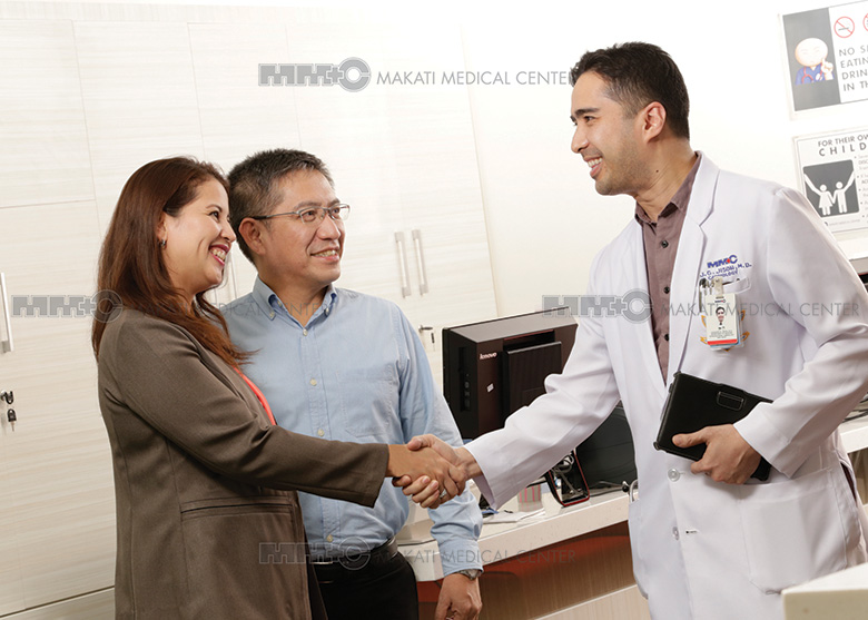 doctor shaking hands with civilian